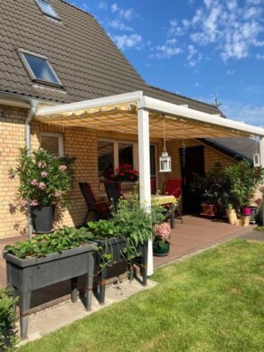 überdachte Terrasse, Zugang von der Küche.jpg - Willkommen Zuhause! Doppelhaushälfte mit Wintergarten und wunderschönem Garten in Hamburg- Farmsen